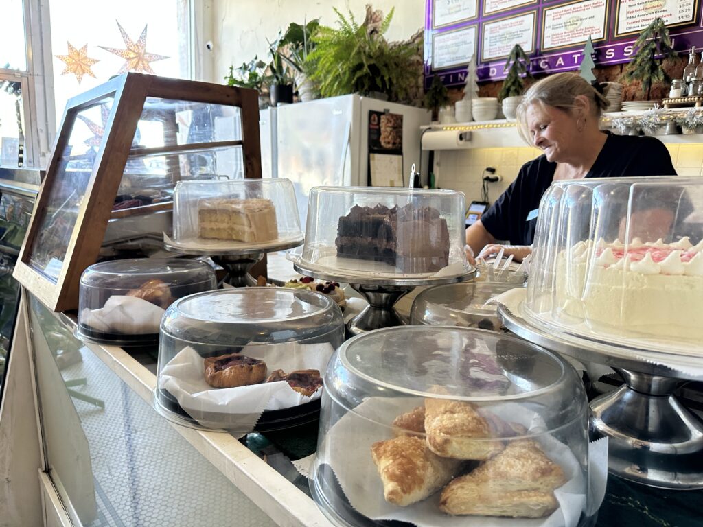 Image Miss L's Sandwich Shop Counter full of Cakes