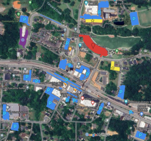 Annotated map of an urban area showing parking locations (marked with blue 'P'), businesses, a playground, a church, and highlighted sections in red and yellow.