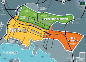 Map of Acworth, GA showing four districts: Historic District (yellow), Parkside District (green), Mill District (orange), and Lake Acworth (blue), with key roads and landmarks marked.