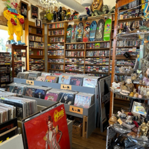 The vintage store in Acworth showcases shelves of vinyl records, CDs, and skateboards. Amidst the nostalgic memorabilia and collectibles, a clown mannequin adds whimsy to the eclectic mix. Discover 6 winter combos for fresh food + a good mood alongside your favorite finds.