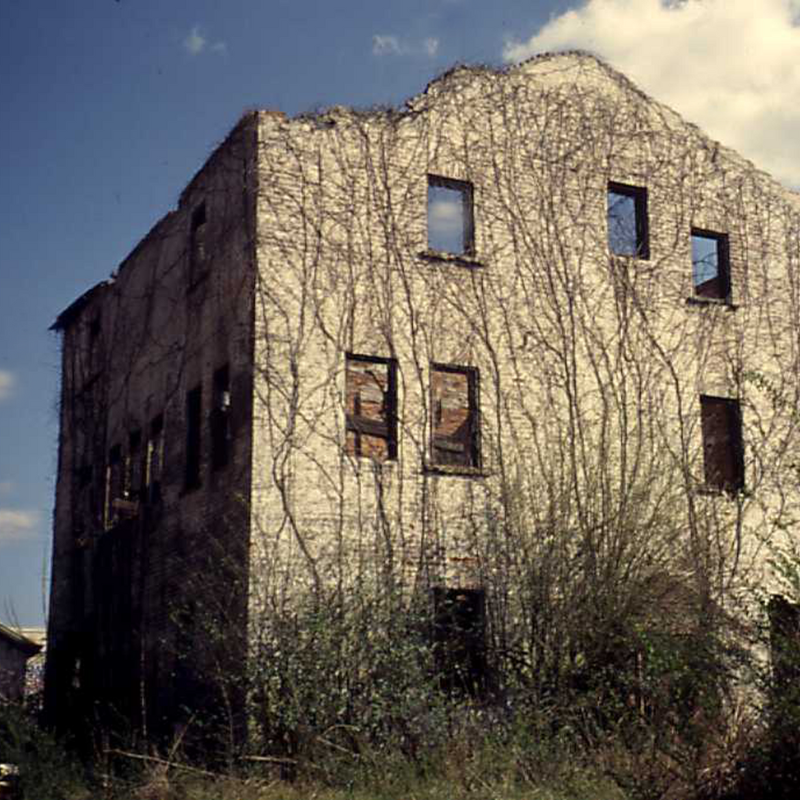 An abandoned, three-story building with boarded windows and vines climbing its weathered exterior under a partly cloudy sky. Learn More About Historic Acworth Locations as you discover stories hidden within these timeless walls. An abandoned, three-story building with boarded windows and vines climbing its weathered exterior under a partly cloudy sky. Learn More About Historic Acworth Locations as you discover stories hidden within these timeless walls.