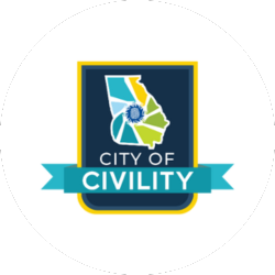 A logo featuring a map of Georgia with colored sections and the text "City of Civility" on a blue background with a blue ribbon banner.
