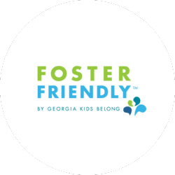 The image displays the Foster Friendly logo by Georgia Kids Belong, featuring green and blue text with a small abstract graphic.