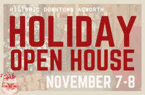 Event flyer with text: "Historic Downtown Acworth Holiday Open House November 7-8," featuring a decorated Christmas tree, stockings on a mantle, and a gift bag with candy canes.