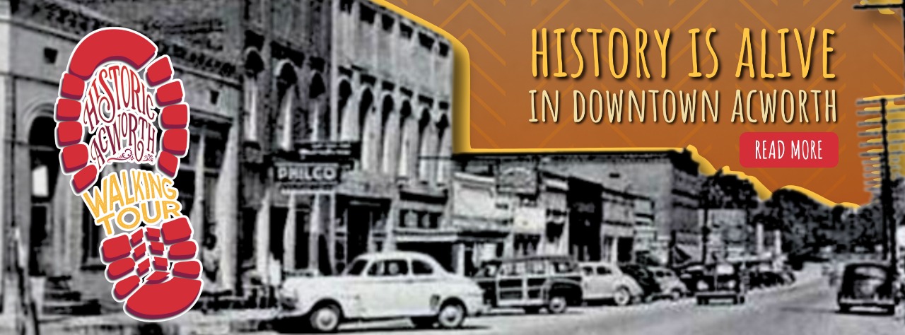 Black and white photo of historic downtown Acworth with vintage cars, overlaid text reads "History Is Alive in Downtown Acworth" and features a walking tour logo.