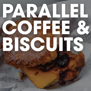 A biscuit with cheese and fruit filling on paper, overlaid with large white text reading “PARALLEL COFFEE & BISCUITS.”—a breakfast worth waking up for in Acworth.