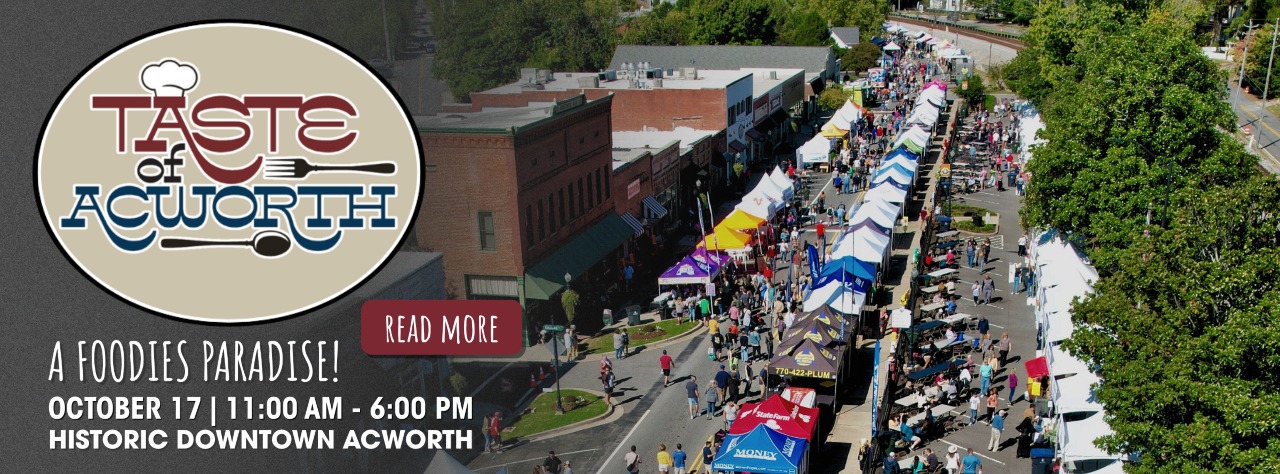 Overhead view of a street festival with booths and crowds; “Taste of Acworth” event details shown, scheduled for October 17 from 11 AM to 6 PM in Historic Downtown Acworth.